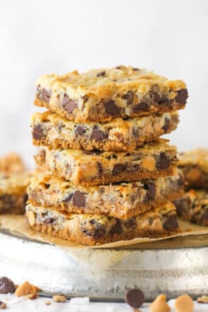 Side view of a stack of magic cookie bars.